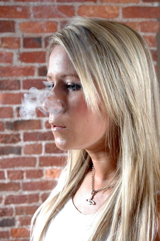 16P Naughty teen smoker aged 18 smokes a cigarette