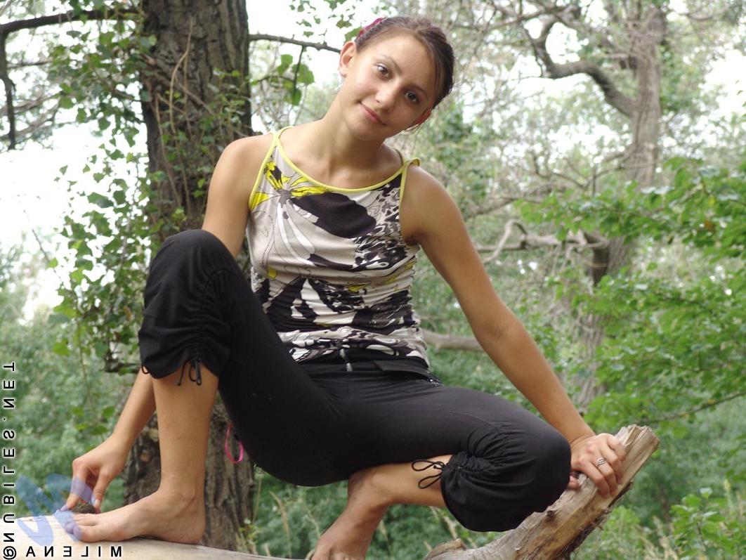 18P Petite teen with tiny titties poses nude outdoors