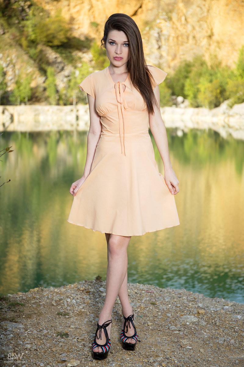 16P Sexy teen Serena strips and spreads her pussy outdoors