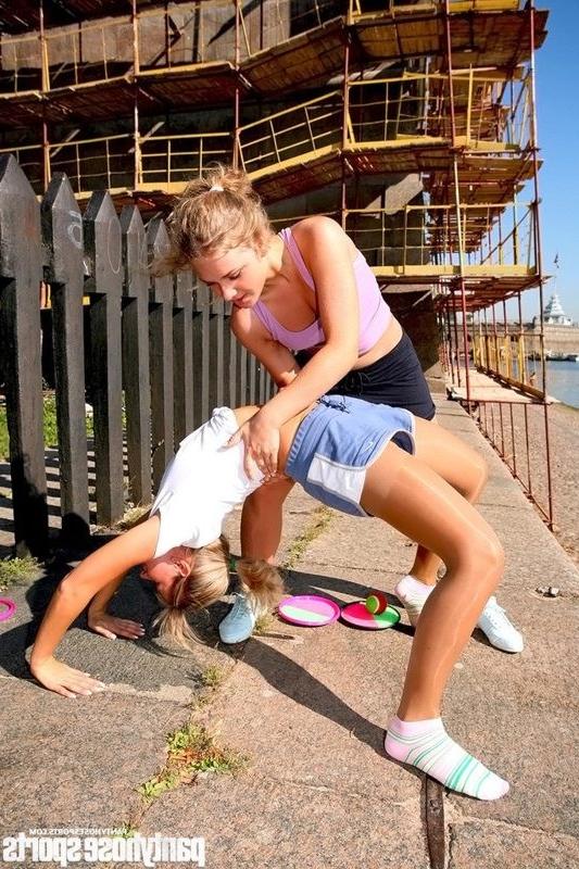 12P Two sports girls do outdoor pantyhose drills