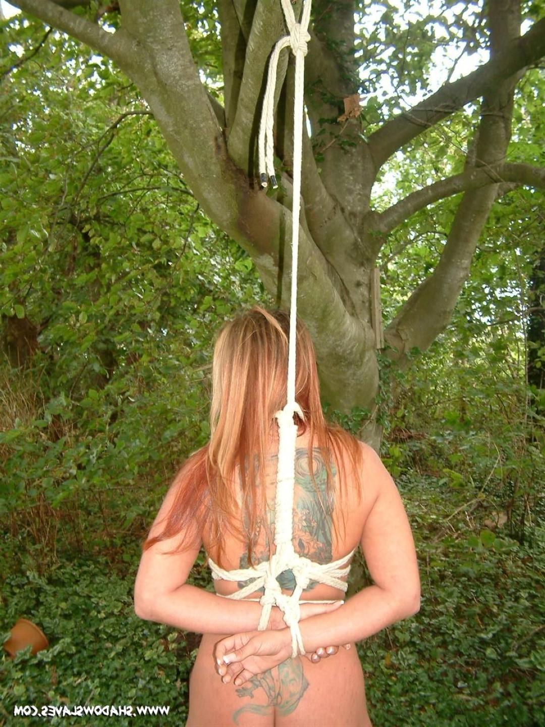 16P Tattooed mature submissive in outdoor bondage with busty Gina