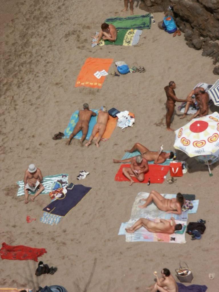 15P When this nudist babe is bare, all eyes are on her