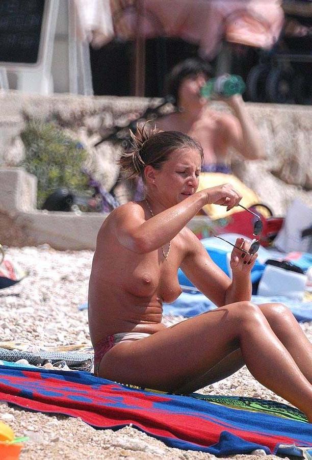 15P When this nudist babe is bare, all eyes are on her