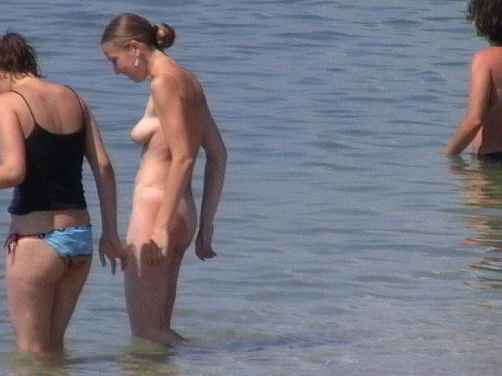 15P Curvy teen bares all at a nudist beach in the sun