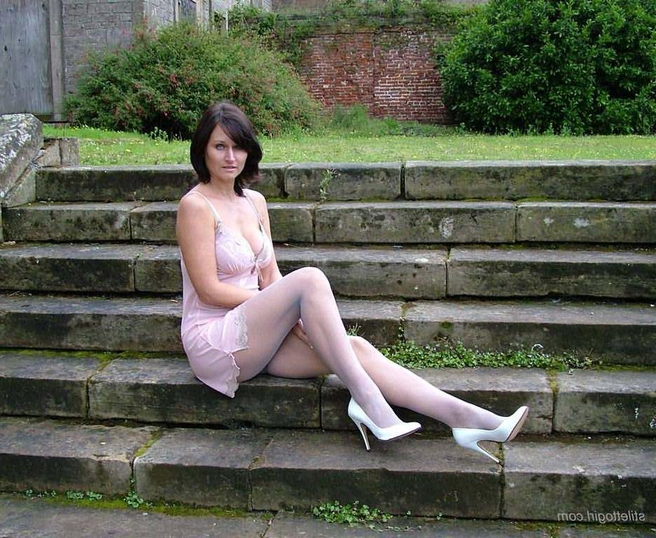 15P Stiletto girl in stockings and high heels outdoors