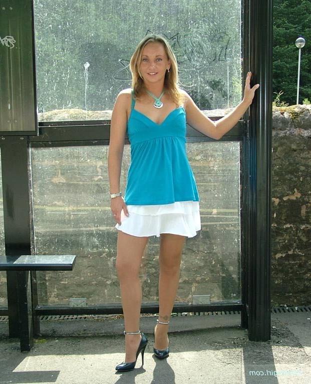 15P Stiletto girl in stockings and high heels outdoors