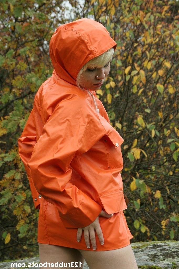 20P Sexy girl with big breasts outdoors in colorful rainwear
