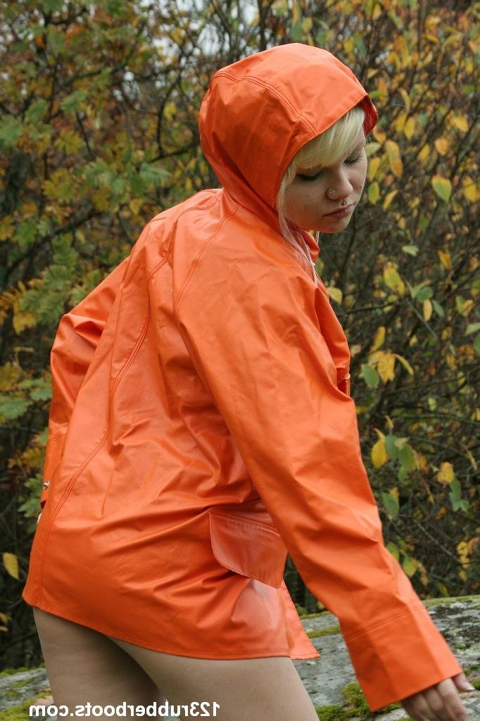 20P Sexy girl with big breasts outdoors in colorful rainwear