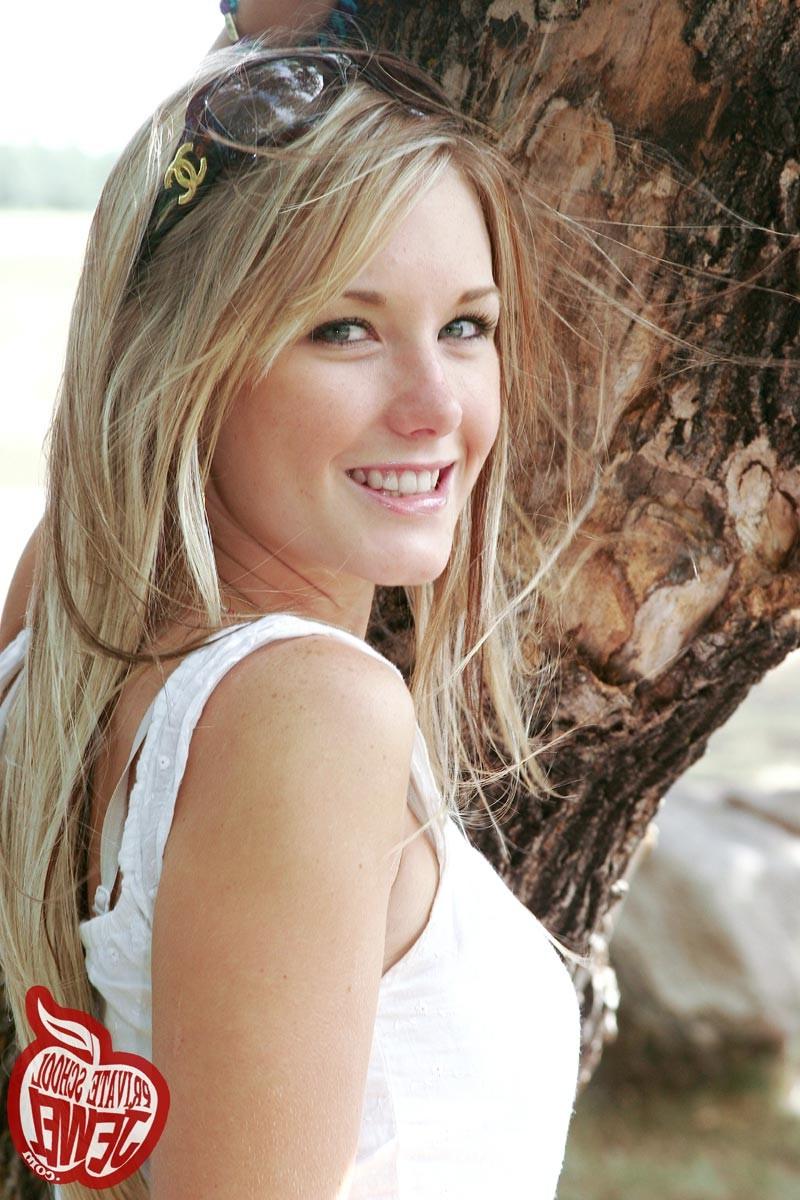 16P Cute blonde teen girl outdoors