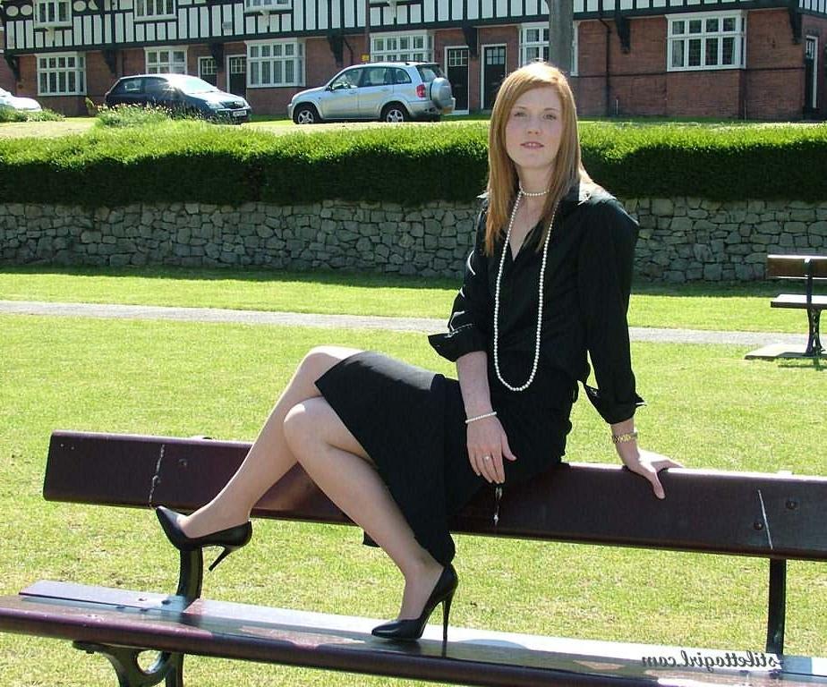 15P Stiletto girl in stockings posing outdoors