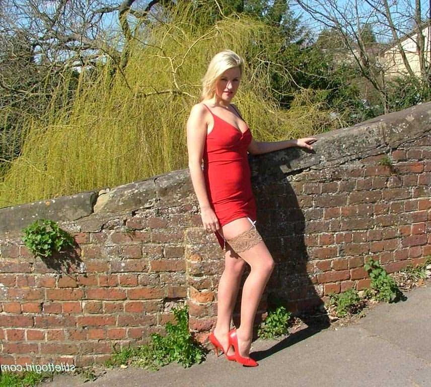 15P Stiletto girl in stockings posing outdoors