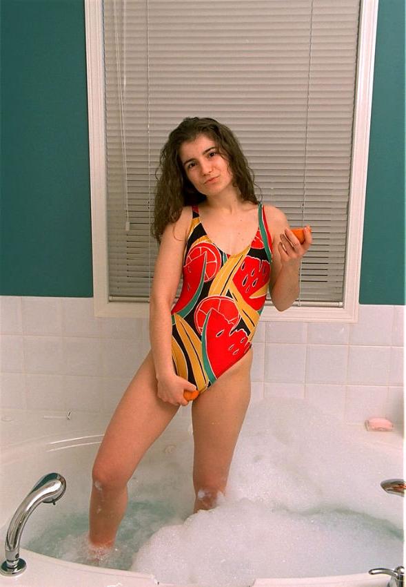 15P Lovely amateur babe bathing boobies