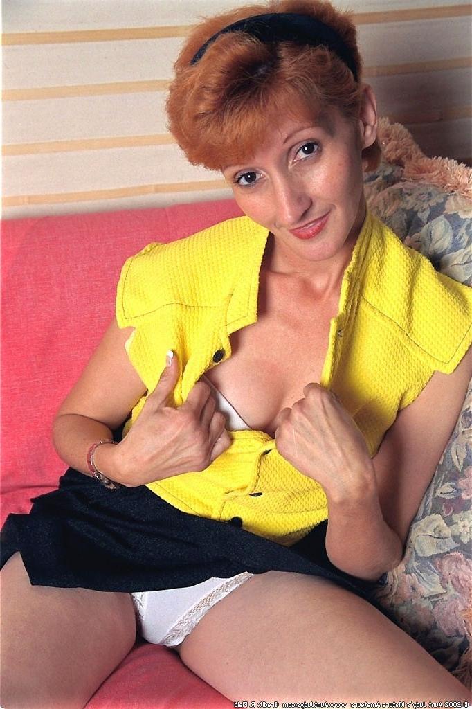 12P Busty mature redhead spreading her aged pussy