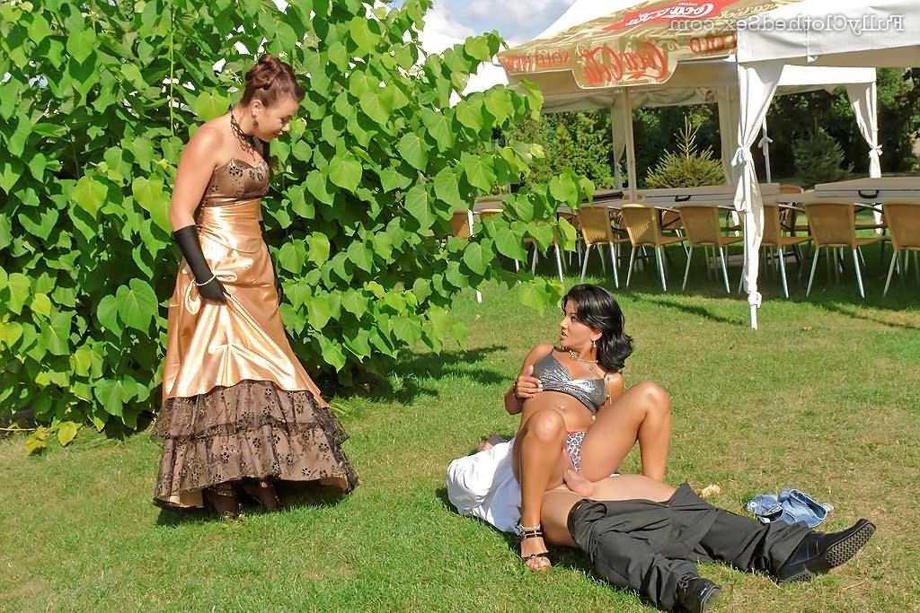 16P Two sexy dressed sluts riding cock outdoors