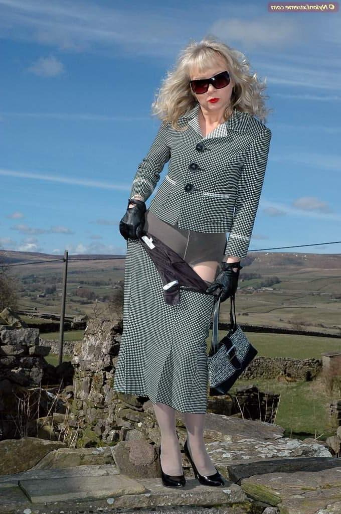 12P Leggy nylon Sue in grey stockings outdoors