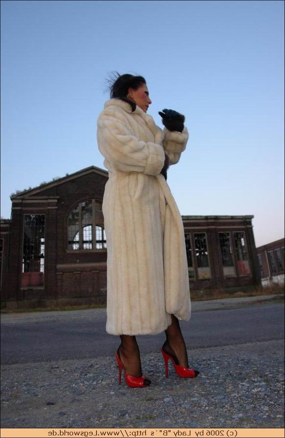 12P Kinky german lady in fur posing outdoor