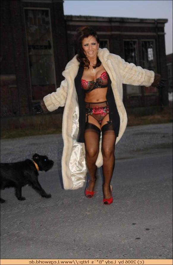 12P Kinky german lady in fur posing outdoor