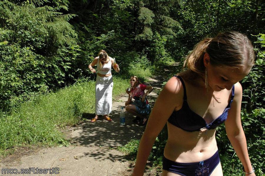 12P Slim sexy girl in lingerie disrobes for outdoor pissing