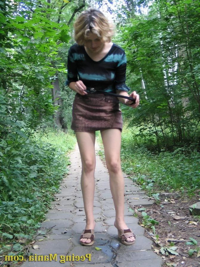15P Blonde gal not only pees outdoors but also shows off her nude boobs
