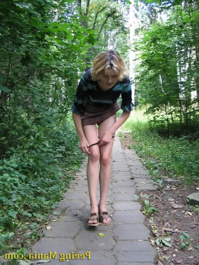 15P Blonde gal not only pees outdoors but also shows off her nude boobs