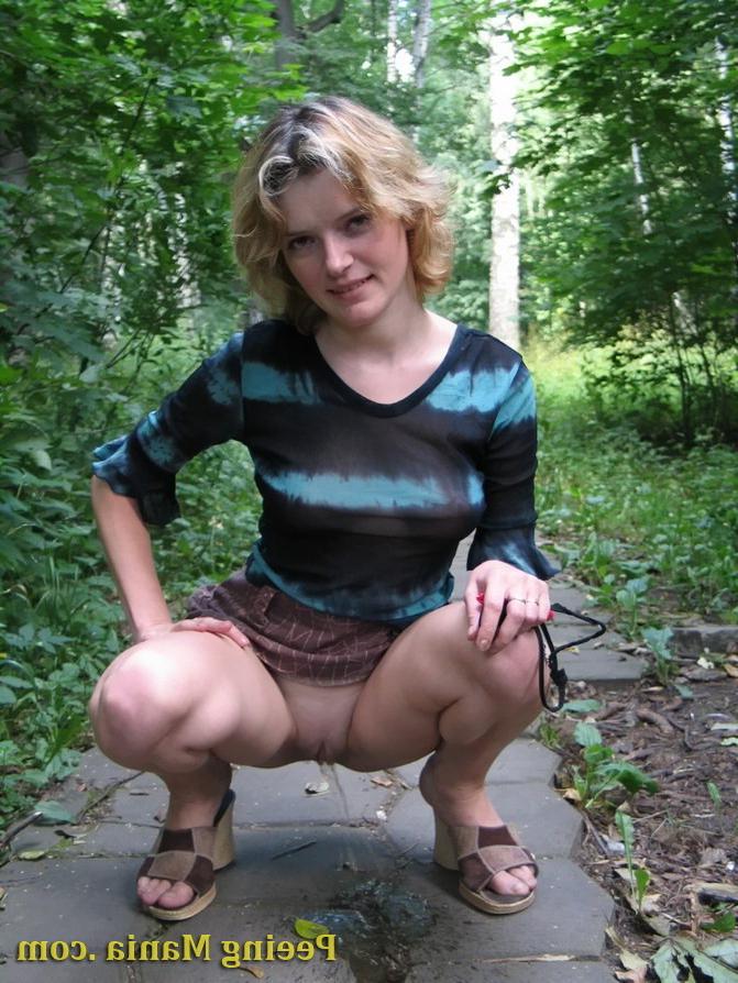 15P Blonde gal not only pees outdoors but also shows off her nude boobs