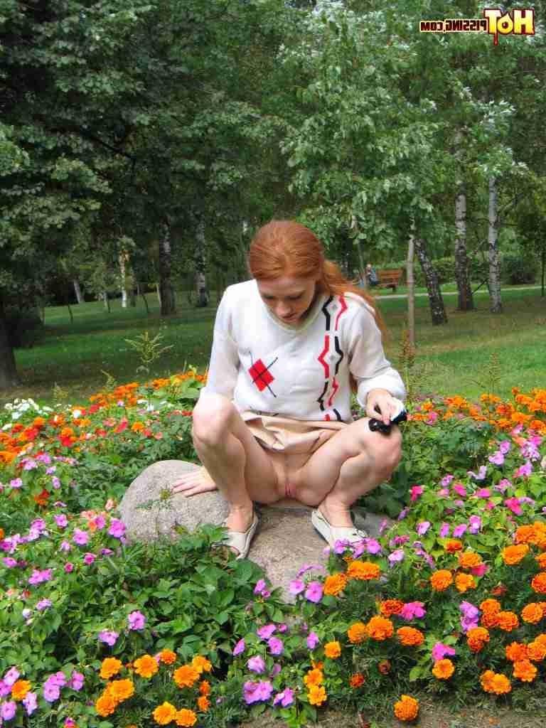 16P Redhead peeing outdoors
