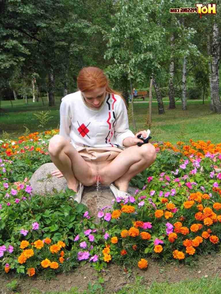 16P Redhead peeing outdoors
