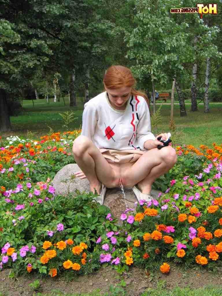 16P Redhead peeing outdoors