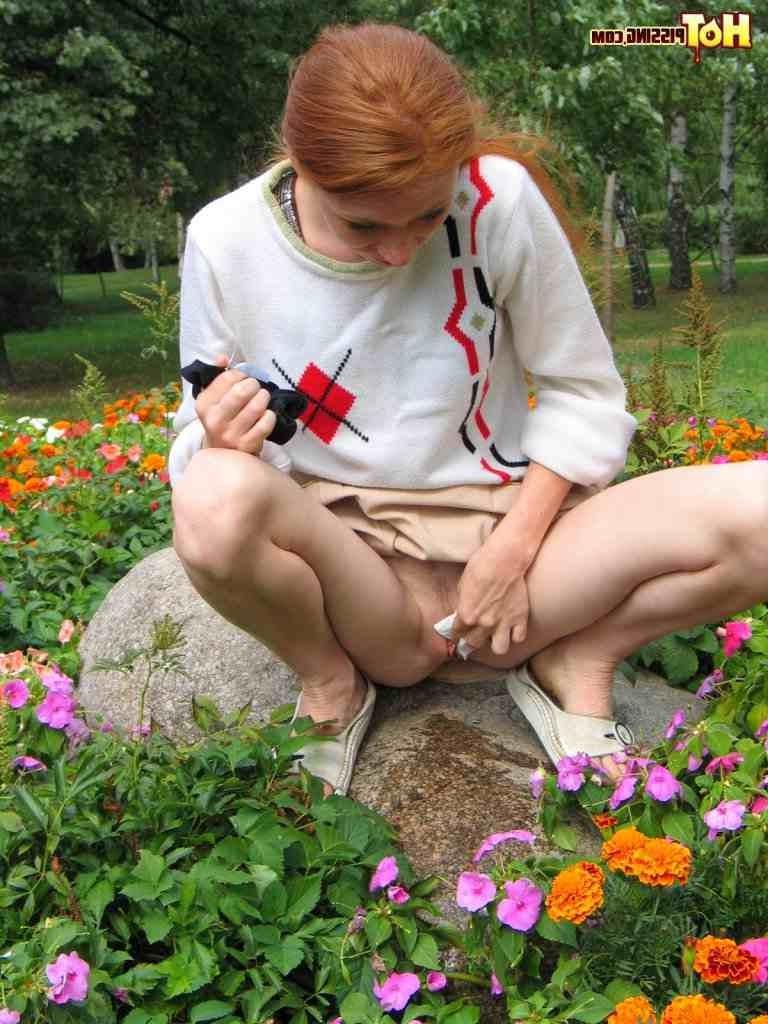 16P Redhead peeing outdoors