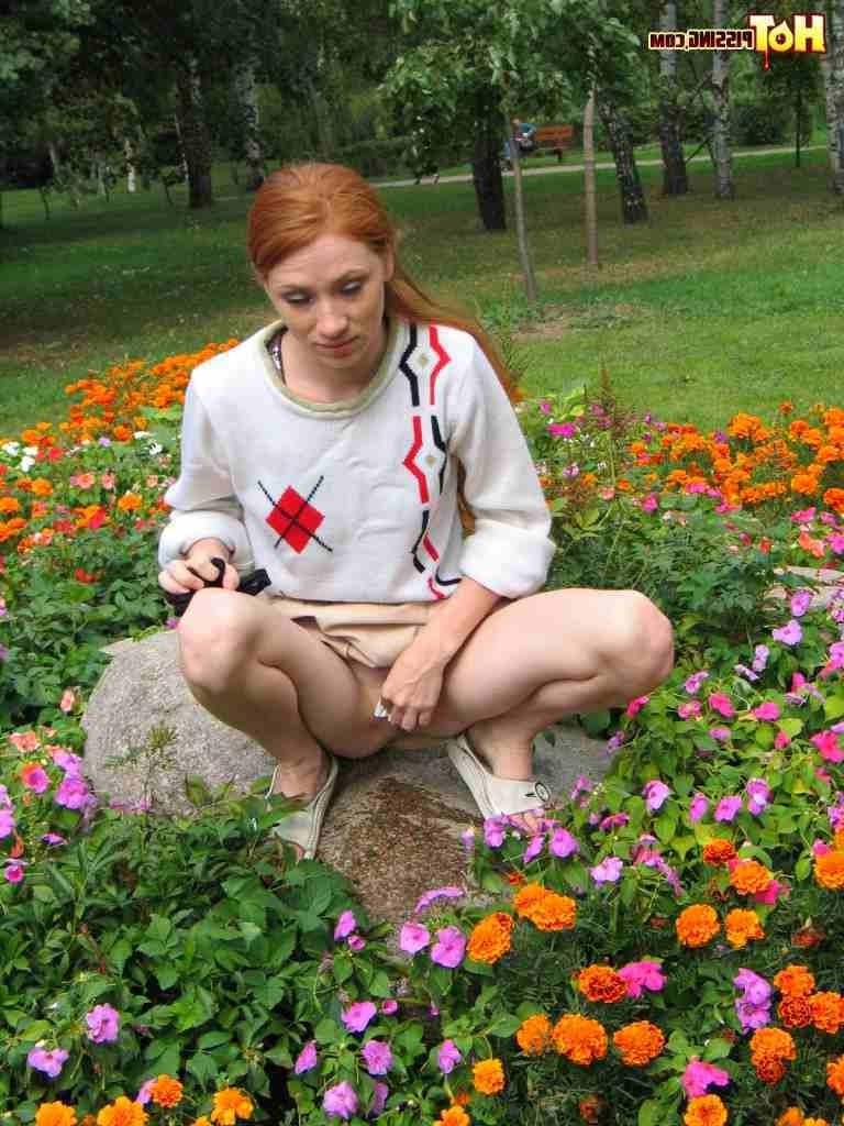 16P Redhead peeing outdoors