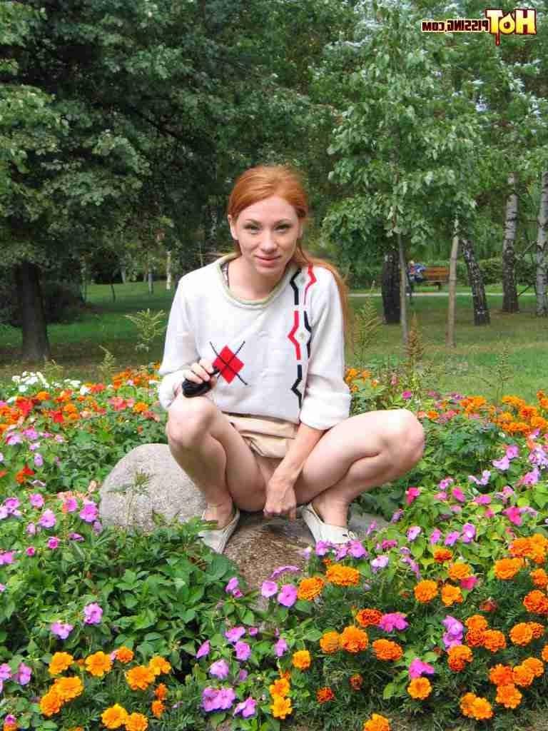 16P Redhead peeing outdoors