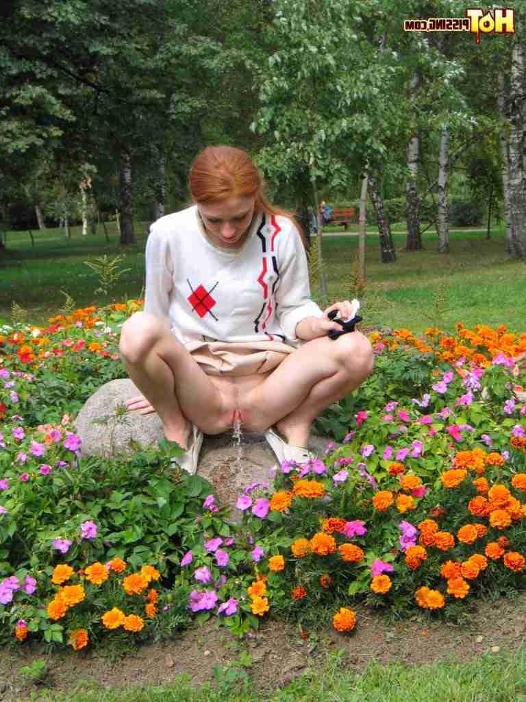 16P Redhead peeing outdoors