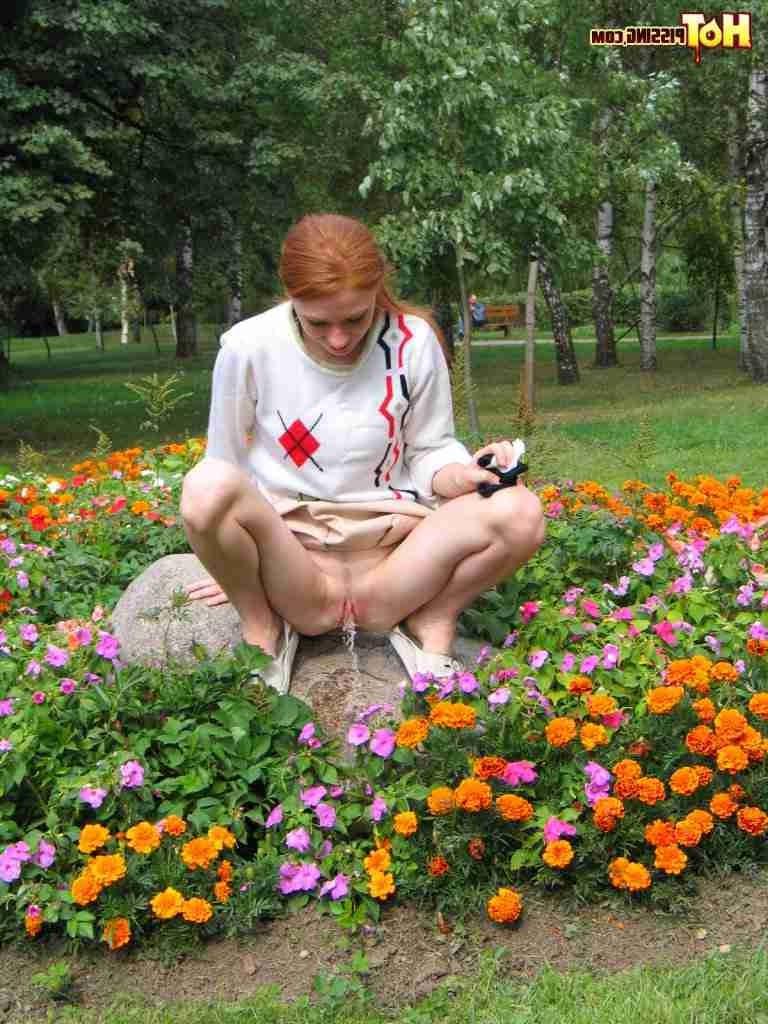 16P Redhead peeing outdoors