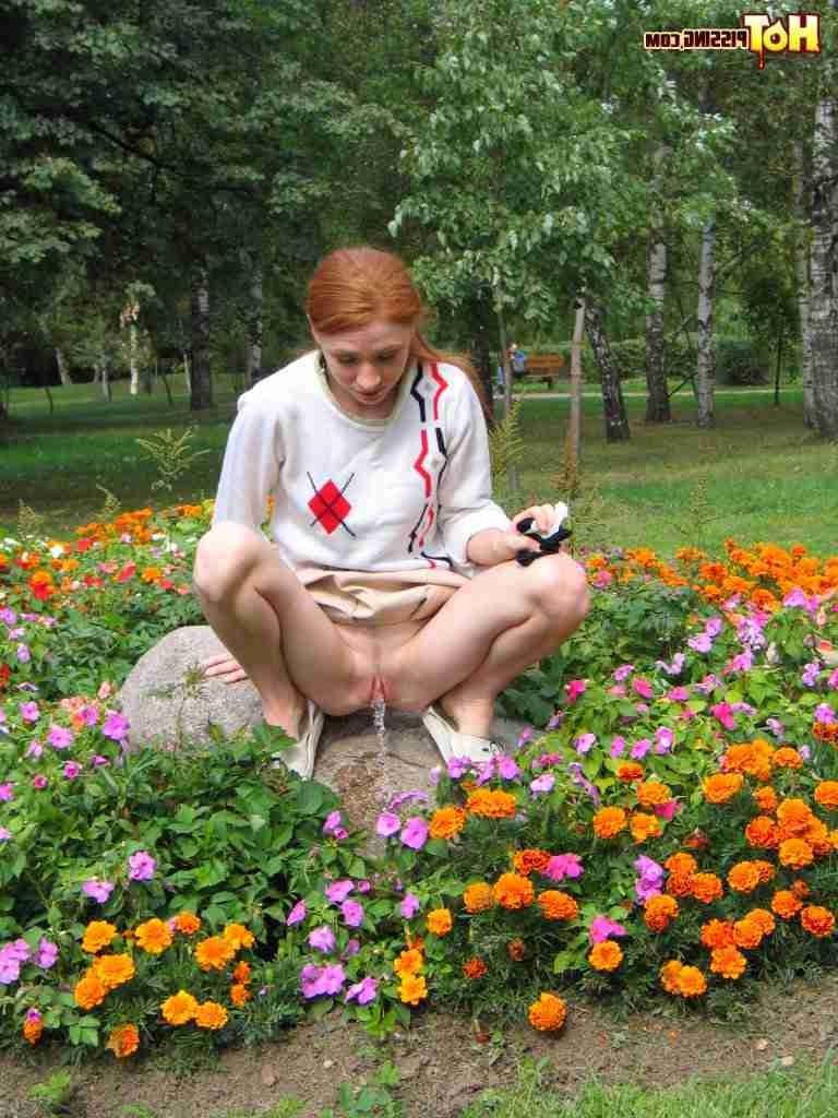 16P Redhead peeing outdoors
