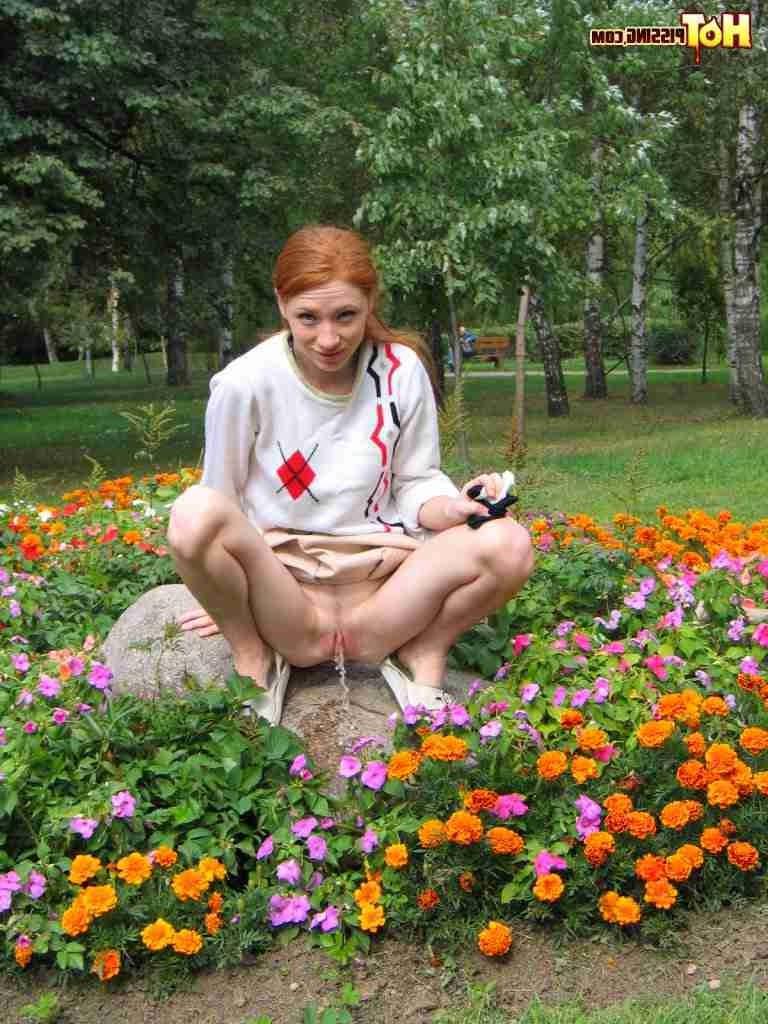 16P Redhead peeing outdoors
