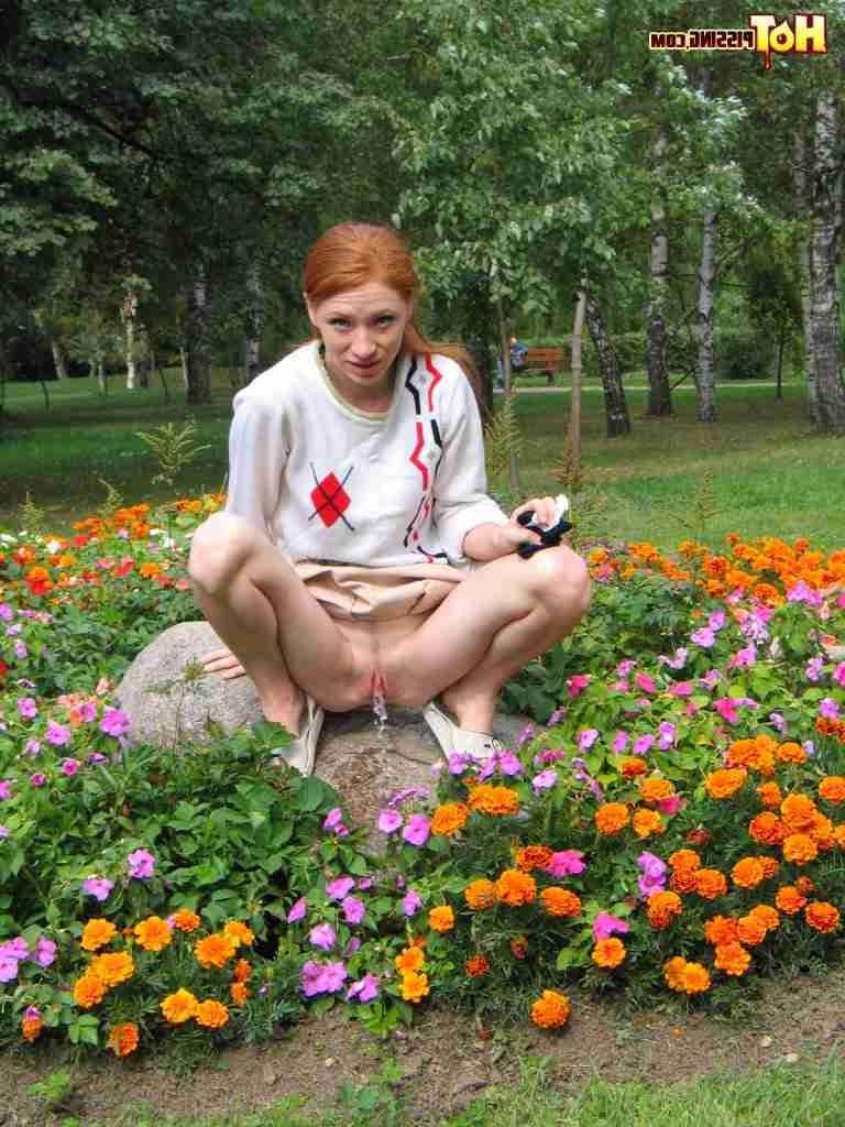 16P Redhead peeing outdoors