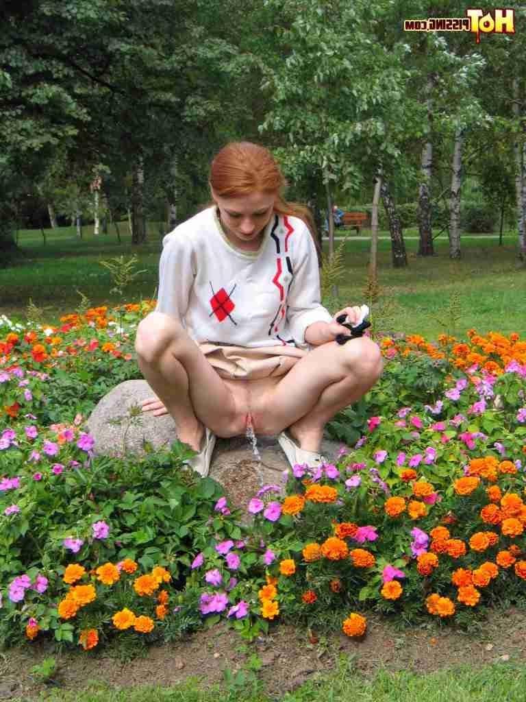 16P Redhead peeing outdoors