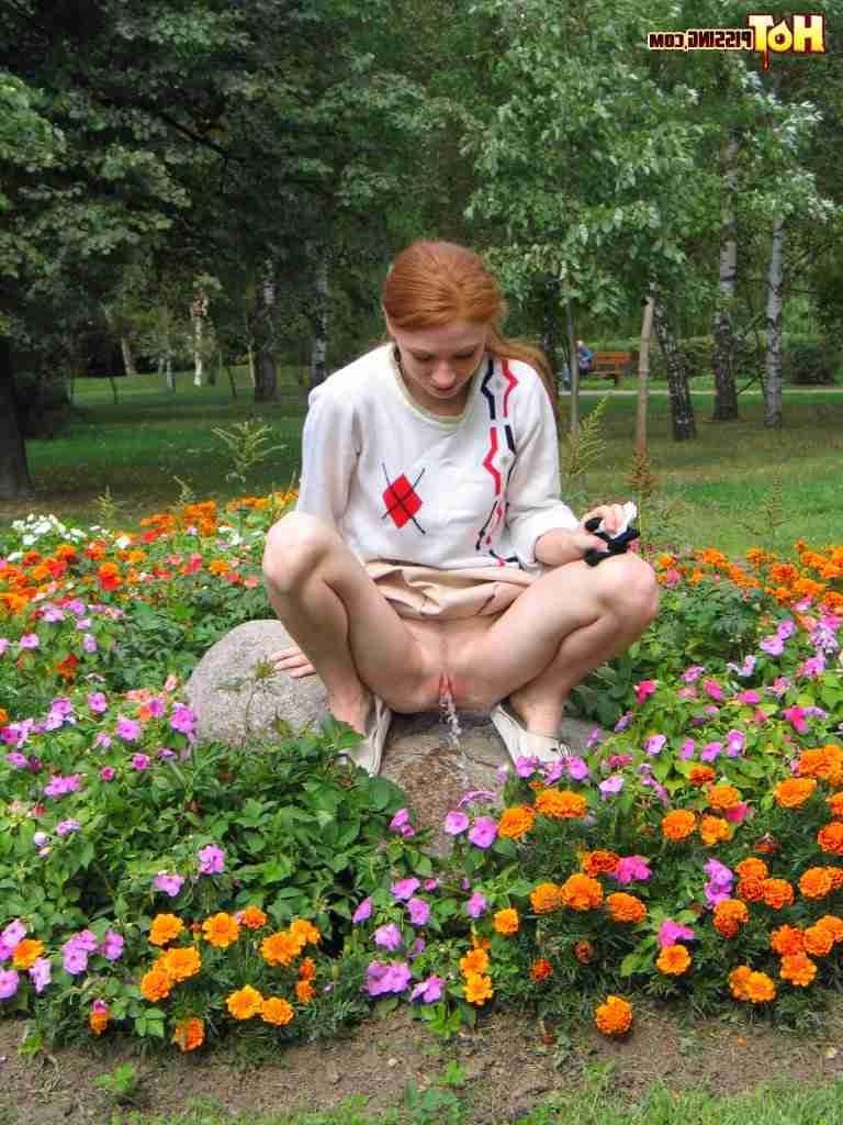 16P Redhead peeing outdoors