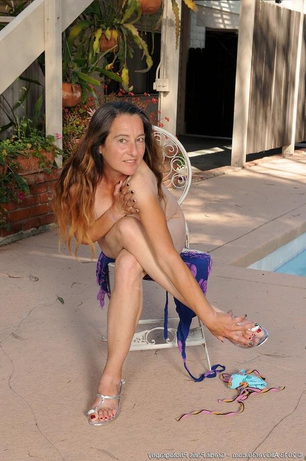 15P Hairy Mature Momma Plays With Her Hairy Pussy Outdoors