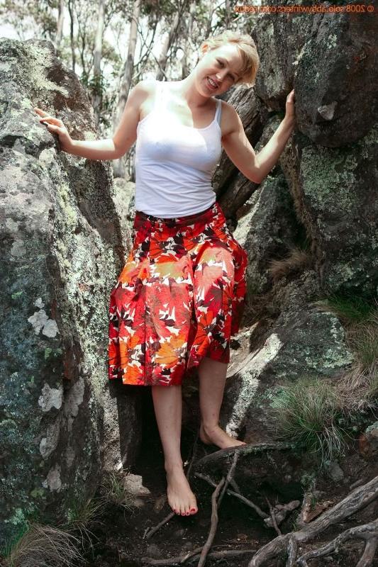 15P Hairy girl Anneke shows her natural bush outdoor