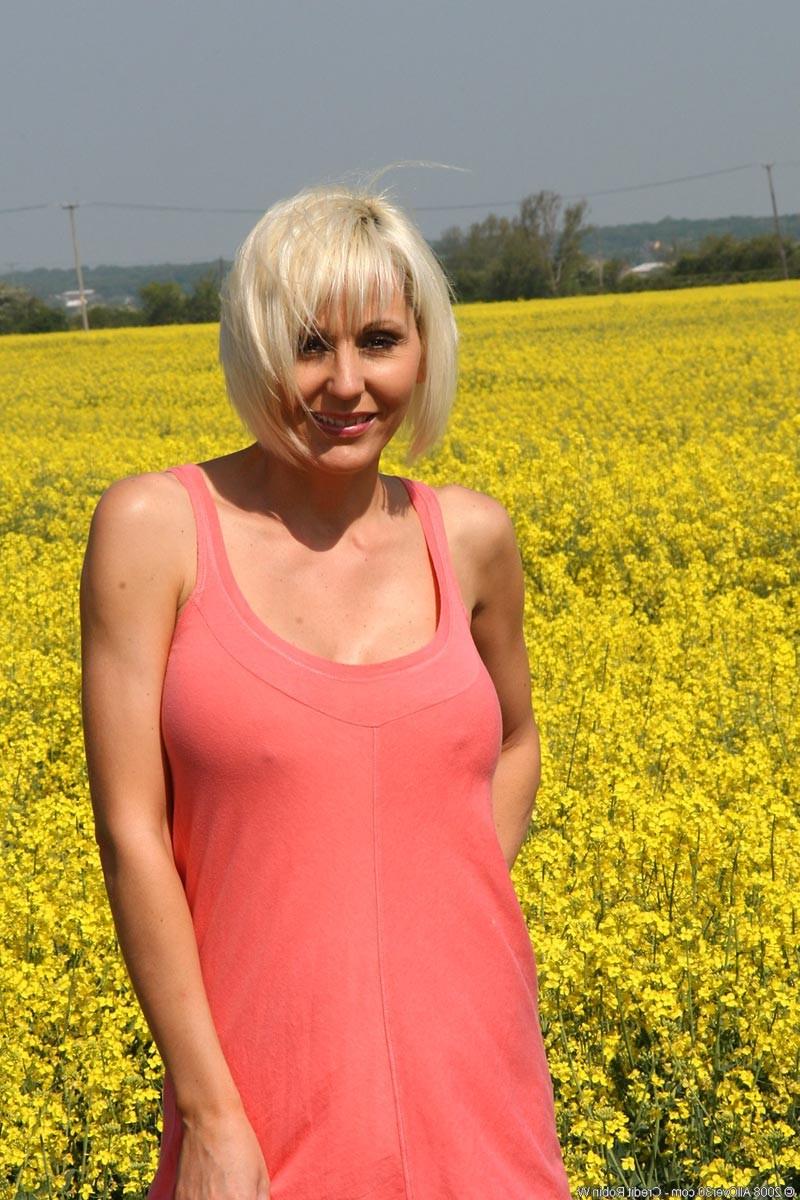 15P Blonde milf with huge round tits having fun in the outdoors