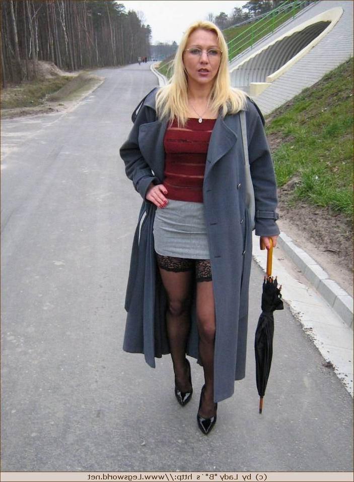 12P Leggy german amateur in stockings poses outdoors