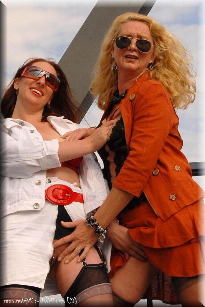 12P Two mature lesbians in stockings having fun outdoors