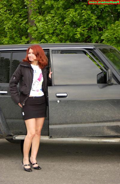 15P Sweet redhead beauty peeing on newspaper outdoors