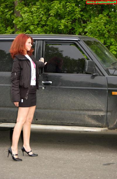 15P Sweet redhead beauty peeing on newspaper outdoors