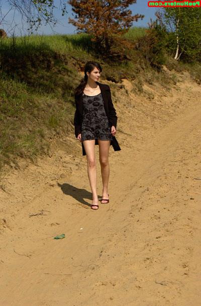 16P Brunette beauty drinking juice and peeing outdoors