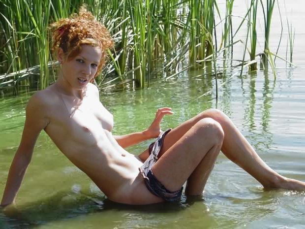 16P Redhead Water Babe Frolics Naked Outdoors in Pond
