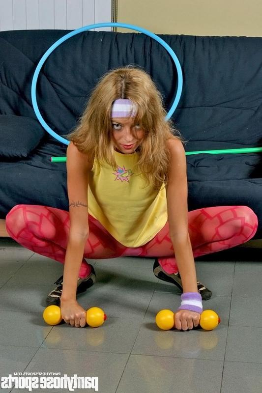 12P Redheaded Ladyb in red pantyhose working out with dumbbells