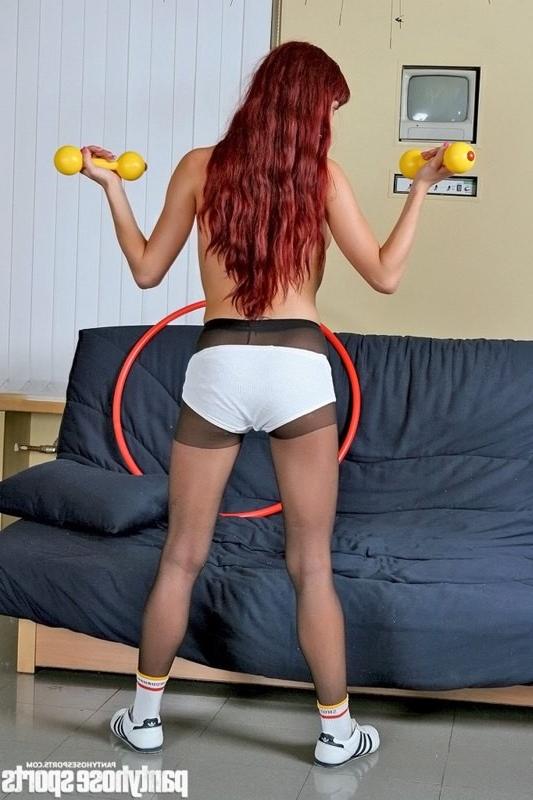 12P Tall redhead dumbbells in black pantyhose