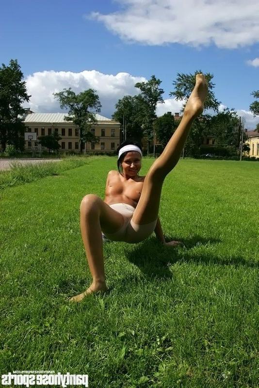 12P Gymnast trains up her legs in pantyhose